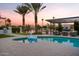 Inviting pool and patio area with pergola and outdoor seating at 1710 W Glacier Way, Chandler, AZ 85248