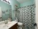 Clean bathroom with shower/tub and patterned curtain at 17545 W Canyon Ln, Goodyear, AZ 85338