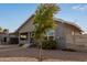 Charming bungalow with a spacious front yard at 305 W 9Th St, Casa Grande, AZ 85122