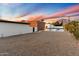 Landscaped backyard with gravel and partial view of pool at 3807 N 55Th Pl, Phoenix, AZ 85018