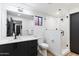 Clean bathroom with a glass shower and modern vanity at 3807 N 55Th Pl, Phoenix, AZ 85018