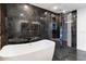 Bathroom with freestanding tub and walk-in shower at 3807 N 55Th Pl, Phoenix, AZ 85018