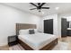 Spacious bedroom with wood bed frame and neutral decor at 3807 N 55Th Pl, Phoenix, AZ 85018