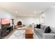 Cozy living room with fireplace and comfortable seating at 3807 N 55Th Pl, Phoenix, AZ 85018