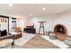 Bright living room features a fireplace and hardwood floors at 3807 N 55Th Pl, Phoenix, AZ 85018