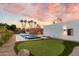 Expansive backyard with a refreshing pool and putting green at 3807 N 55Th Pl, Phoenix, AZ 85018