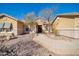 Beautiful two-story home with a landscaped front yard and inviting entryway at 38724 N Donovan Ln, Anthem, AZ 85086