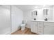 Modern bathroom with double vanity, shower and tile flooring at 4404 N 20Th St, Phoenix, AZ 85016