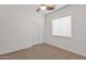 Bright bedroom with carpet flooring and double door closet at 5026 W Parsons Rd, Phoenix, AZ 85083