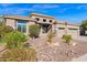 House exterior with a two-car garage and well-maintained landscaping at 5026 W Parsons Rd, Phoenix, AZ 85083