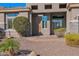 Landscaped front yard with stone accents and drought-tolerant plants at 5026 W Parsons Rd, Phoenix, AZ 85083
