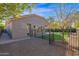 Home's exterior showcasing a backyard with artificial turf at 5026 W Parsons Rd, Phoenix, AZ 85083