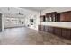 Bright living area with hardwood floors, built-in cabinetry, and a view to the backyard at 5026 W Parsons Rd, Phoenix, AZ 85083