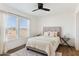 Cozy bedroom with a comfortable bed and plenty of natural light at 53259 W Barn Owl Rd, Maricopa, AZ 85139