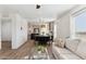 Bright living room with hardwood floors and open layout at 53259 W Barn Owl Rd, Maricopa, AZ 85139