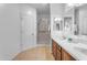 Elegant bathroom with double vanity, a shower, and plenty of storage at 5341 E Carol Ave, Mesa, AZ 85206