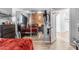 Bedroom with red bedding and mirrored closet at 5341 E Carol Ave, Mesa, AZ 85206