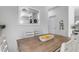 Dining area with a wooden table and white chairs at 5341 E Carol Ave, Mesa, AZ 85206