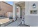 Home's entrance with walkway and potted plants at 5341 E Carol Ave, Mesa, AZ 85206