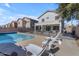 Relaxing pool with lounge chairs in backyard at 5341 E Carol Ave, Mesa, AZ 85206