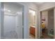 Clean bathroom with shower/tub combo and wood-look floors at 639 W Kingman Loop, Casa Grande, AZ 85122