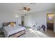 Bright bedroom with a queen bed and ensuite bathroom at 639 W Kingman Loop, Casa Grande, AZ 85122