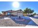 One-story house with a two-car garage and landscaped front yard at 639 W Kingman Loop, Casa Grande, AZ 85122