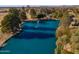 Arial view of a community lake with fountain at 639 W Kingman Loop, Casa Grande, AZ 85122