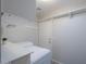 Laundry room with washer, dryer, and overhead storage at 639 W Kingman Loop, Casa Grande, AZ 85122