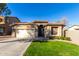 One-story house with a two-car garage and landscaped yard at 6492 S View Ln, Gilbert, AZ 85298