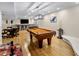Game room with pool table, bar, and seating area at 6542 E Ludlow Dr, Scottsdale, AZ 85254