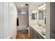 Clean bathroom with a bathtub, vanity, and updated fixtures at 6542 E Ludlow Dr, Scottsdale, AZ 85254