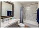 Clean bathroom with marble tile and modern fixtures at 6542 E Ludlow Dr, Scottsdale, AZ 85254