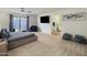 Spacious bedroom with a plush bed and access to a private patio at 6542 E Ludlow Dr, Scottsdale, AZ 85254