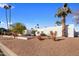 White stucco home with landscaping and walkway at 6542 E Ludlow Dr, Scottsdale, AZ 85254