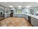 Modern kitchen with gray cabinets and quartz countertops at 6542 E Ludlow Dr, Scottsdale, AZ 85254