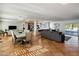 Open floor plan living area with tile floors and modern furniture at 6542 E Ludlow Dr, Scottsdale, AZ 85254