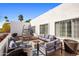 Patio with fire pit and comfortable seating at 6542 E Ludlow Dr, Scottsdale, AZ 85254