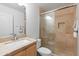 Clean bathroom with a walk-in shower and modern vanity at 6940 E Cochise Rd # 1011, Paradise Valley, AZ 85253