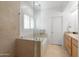 Elegant bathroom with soaking tub and glass shower enclosure at 6940 E Cochise Rd # 1011, Paradise Valley, AZ 85253