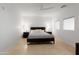 Spacious bedroom with ceiling fan and large windows at 6940 E Cochise Rd # 1011, Paradise Valley, AZ 85253