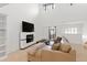 Spacious living room with fireplace and high ceilings at 6940 E Cochise Rd # 1011, Paradise Valley, AZ 85253