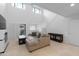 Comfortable living room with vaulted ceilings and fireplace at 6940 E Cochise Rd # 1011, Paradise Valley, AZ 85253