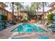 Community pool and spa with ample lounge chairs at 6940 E Cochise Rd # 1011, Paradise Valley, AZ 85253