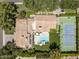 Aerial view of the property showing house, pool, and sports courts at 7305 E Royal Palm Rd, Scottsdale, AZ 85258