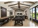 Game room featuring a pool table, shuffleboard, and exposed beams at 7305 E Royal Palm Rd, Scottsdale, AZ 85258