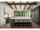 Gourmet kitchen featuring a large island, high-end appliances, and exposed wooden beams at 7305 E Royal Palm Rd, Scottsdale, AZ 85258