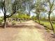 Paved path through a tree-lined community area at 7709 S 72Nd Dl, Laveen, AZ 85339