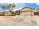 Picture of a single Gathering home with a front yard and a two-car garage at 7709 S 72Nd Dl, Laveen, AZ 85339