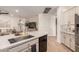 Spacious kitchen with an island and open layout to the living area at 7709 S 72Nd Dl, Laveen, AZ 85339